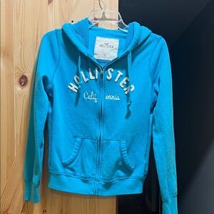 Hollister Teal Hoodie with Embroidered Logo size large
